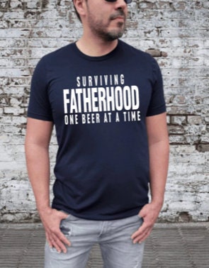 Surviving Fatherhood One Beer at a Time T-shirt